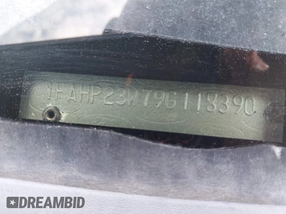 ✅ 2009 Ford Taurus SE • VIN: 1FAHP23W79G118390 • Lot: 40930355. Listed on IAAI with 246,400 mi. Free auction sales archive from the USA and detailed vehicle history report at DreamBid. Image 13.