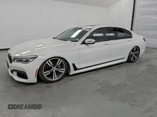 ✅ 2016 BMW 7 Series 750i • VIN: WBA7F0C53GGM20614 • Lot: 91177505. Listed on Copart with 80,010 mi. Free auction sales archive from the USA and detailed vehicle history report at DreamBid. Image 1.