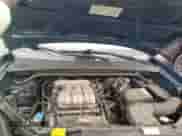 2005 Hyundai Tucson GLS z VIN KM8JN72D85U131798, wystawiony jako Copart lot #79274634 z przebiegiem 122 271 mil mil oraz Szkoda całkowita • Salvage title. Historia ofert i sprzedaży dostępna na DreamBid. Obrazek 11.