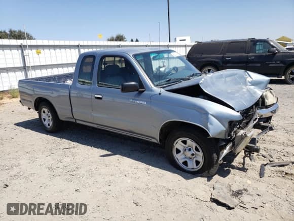 ✅ 1997 Toyota Tacoma • VIN: 4TAVL52N9VZ263217 • Lot: 69307475. Listed on Copart with 298,263 mi. Free auction sales archive from the USA and detailed vehicle history report at DreamBid. Image 4.
