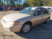 ✅ 1998 Ford Escort • VIN: 1FALP10P9WW106311 • Lot: 43613665. Listed on IAAI with 159,878 mi. Free auction sales archive from the USA and detailed vehicle history report at DreamBid. Image 2.