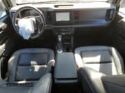 ✅ 2023 Ford Bronco • VIN: 1FMDE5CH2PLC18267 • Lot: 46698555. Listed on Copart with 13,189 mi. Free auction sales archive from the USA and detailed vehicle history report at DreamBid. Image 8.