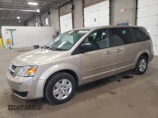 2009 Dodge Grand Caravan SE with VIN 1D8HN44E99B502686, listed as a Copart auction lot 81763585 with 132,009 mi miles and Salvage title. Bid and sale history available at DreamBid. Image 1.
