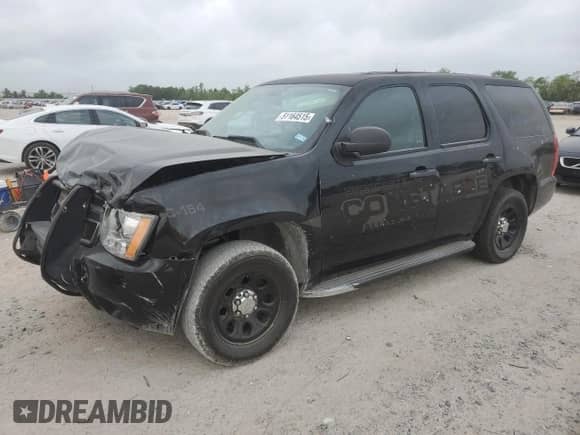 2014 Chevrolet Tahoe Commercial with VIN 1GNLC2E07ER168446, listed as a Copart auction lot 51164515 with 75,720 mi miles and Salvage title. Bid and sale history available at DreamBid. Image 1.