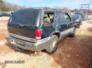 ✅ 2000 GMC Jimmy SLE Convenience • VIN: 1GKDT13W8Y2168245 • Lot: 41348643. Wystawiony na IAAI z przebiegiem 285 714 mil. Bezpłatny archiwum sprzedaży aukcyjnych z USA i szczegółowy raport historii pojazdu na DreamBid. Zdjęcie 4.