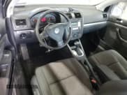 ✅ 2009 Volkswagen Rabbit S • VIN: WVWBB71K49W125525 • Lot: 77537444. Listed on Copart with 141,701 mi. Free auction sales archive from the USA and detailed vehicle history report at DreamBid. Image 8.