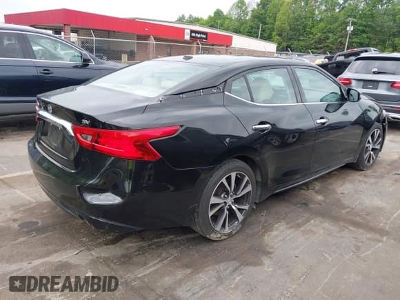 ✅ 2016 Nissan Maxima Platinum • VIN: 1N4AA6AP3GC404117 • Lot: 42343721. Listed on IAAI with 206,730 mi. Free auction sales archive from the USA and detailed vehicle history report at DreamBid. Image 4.