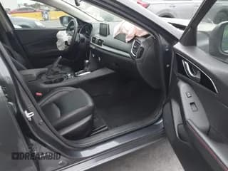 ✅ 2016 Mazda 3 S Touring • VIN: JM1BM1W34G1345542 • Лот: 43647035. Опубликован ранее на IAAI с пробегом 131 339 миль. Бесплатный доступ к архиву аукционных продаж из США и подробный отчёт об истории автомобиля на DreamBid. Изображение 5.