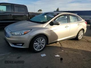 ✅ 2017 Ford Focus Titanium • VIN: 1FADP3J24HL260352 • Лот: 84356405. Опубликован ранее на Copart с пробегом 31 969 миль. Бесплатный доступ к архиву аукционных продаж из США и подробный отчёт об истории автомобиля на DreamBid. Изображение 1.