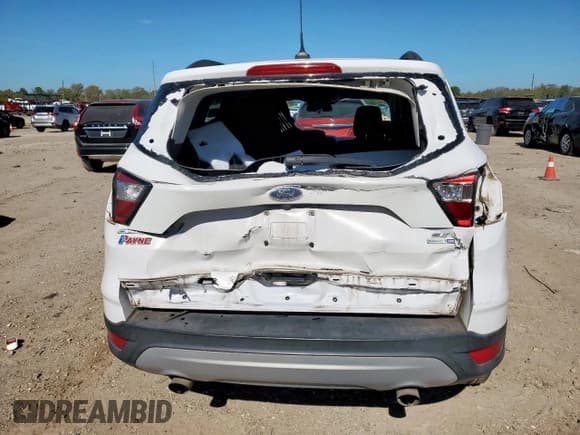 ✅ 2018 Ford Escape SE • VIN: 1FMCU9GD0JUC78448 • Lot: 85408185. Wystawiony na Copart z przebiegiem 55 779 mil. Bezpłatny archiwum sprzedaży aukcyjnych z USA i szczegółowy raport historii pojazdu na DreamBid. Zdjęcie 6.