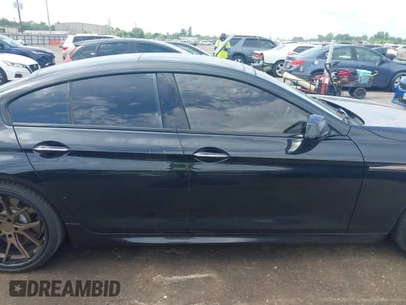 ✅ 2014 BMW 6 Series 650i • VIN: WBA6B2C51ED129160 • Lot: 42458210. Listed on IAAI with 95,339 mi. Free auction sales archive from the USA and detailed vehicle history report at DreamBid. Image 14.