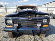 ✅ 1987 Jeep Grand Wagoneer • VIN: 1JCNJ15U9HT036749 • Lot: 51932115. Wystawiony na Copart z przebiegiem Nie podano. Bezpłatny archiwum sprzedaży aukcyjnych z USA i szczegółowy raport historii pojazdu na DreamBid. Zdjęcie 5.