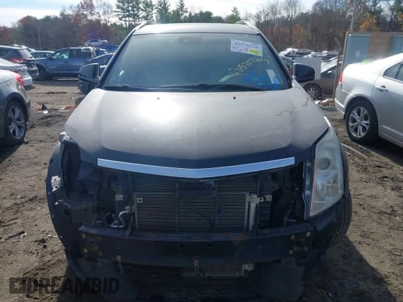 ✅ 2015 Cadillac SRX Luxury Collection • VIN: 3GYFNEE31FS594055 • Lot: 43570725. Wystawiony na IAAI z przebiegiem 100 812 mil. Bezpłatny archiwum sprzedaży aukcyjnych z USA i szczegółowy raport historii pojazdu na DreamBid. Zdjęcie 13.