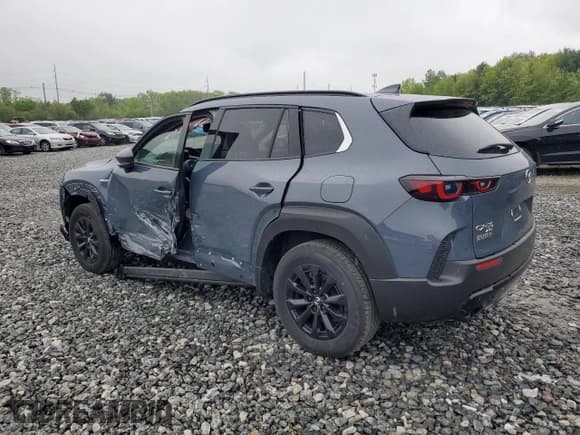 ✅ 2025 Mazda CX-50 Hybrid Premium Package • VIN: 7MMVAADW1SN113985 • Lot: 57218715. Wystawiony na Copart z przebiegiem 1 587 mil. Bezpłatny archiwum sprzedaży aukcyjnych z USA i szczegółowy raport historii pojazdu na DreamBid. Zdjęcie 2.