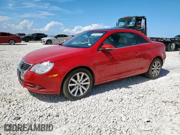 ✅ 2010 Volkswagen Eos Komfort • VIN: WVWBA7AH1AV011483 • Лот: 69276745. Опубликован ранее на Copart с пробегом 92 483 миль. Бесплатный доступ к архиву аукционных продаж из США и подробный отчёт об истории автомобиля на DreamBid. Изображение 1.