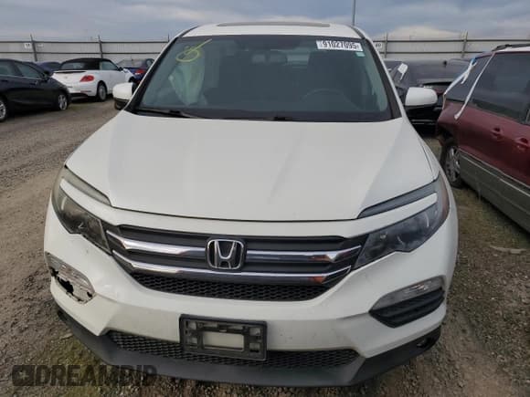 ✅ 2017 Honda Pilot EX-L • VIN: 5FNYF5H81HB018495 • Lot: 91027095. Listed on Copart with 111,888 mi. Free auction sales archive from the USA and detailed vehicle history report at DreamBid. Image 5.
