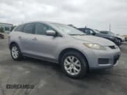 ✅ 2009 Mazda CX-7 Sport • VIN: JM3ER29L690221384 • Lot: 64701455. Listed on Copart with 84,414 mi. Free auction sales archive from the USA and detailed vehicle history report at DreamBid. Image 4.