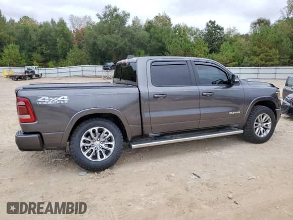 2022 Ram 1500 Laramie с VIN 1C6SRFJT9NN281954, выставлен на аукционе Copart как лот 90458075 с пробегом 52 245 миль миль и Списание • Salvage title. История ставок и продаж доступна на DreamBid. Изображение 3.