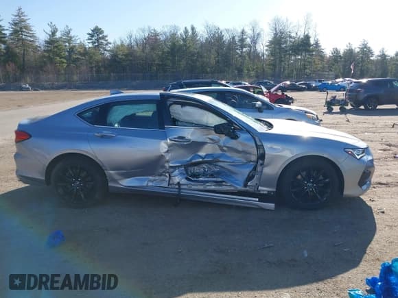 ✅ 2021 Acura TLX • VIN: 19UUB5F3XMA011289 • Lot: 42016697. Listed on IAAI with 28,200 mi. Free auction sales archive from the USA and detailed vehicle history report at DreamBid. Image 13.