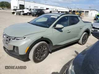 2022 Hyundai Santa Cruz SEL Premium z VIN 5NTJDDAF9NH029270, wystawiony jako Copart lot #81191184 z przebiegiem 61 698 mil mil oraz Nie do naprawy • Non repairable. Historia ofert i sprzedaży dostępna na DreamBid. Obrazek 1.