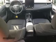 ✅ 2025 Toyota Corolla Hybrid LE • VIN: JTDBCMFE1S3079335 • Lot: 86473205. Listed on Copart with 8,715 mi. Free auction sales archive from the USA and detailed vehicle history report at DreamBid. Image 8.