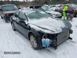 2021 Toyota Camry LE с VIN 4T1C11BK7MU037295, выставлен на аукционе IAAI как лот 41297092 с пробегом 23 755 миль миль и . История ставок и продаж доступна на DreamBid. Изображение 1.