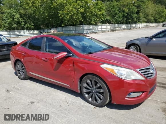 ✅ 2012 Hyundai Azera • VIN: KMHFH4JG9CA157381 • Лот: 70351685. Опубликован ранее на Copart с пробегом 165 672 миль. Бесплатный доступ к архиву аукционных продаж из США и подробный отчёт об истории автомобиля на DreamBid. Изображение 4.