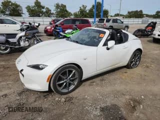 ✅ 2022 Mazda MX-5 Miata Grand Touring • VIN: JM1NDAM76N0505880 • Lot: 71831585. Listed on Copart with Not provided. Free auction sales archive from the USA and detailed vehicle history report at DreamBid. Image 1.