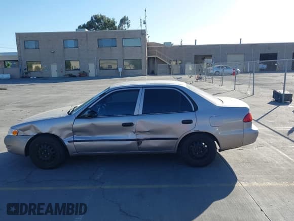 ✅ 2000 Toyota Corolla VE • VIN: 1NXBR12EXYZ343752 • Lot: 42896467. Listed on IAAI with 251,772 mi. Free auction sales archive from the USA and detailed vehicle history report at DreamBid. Image 6.