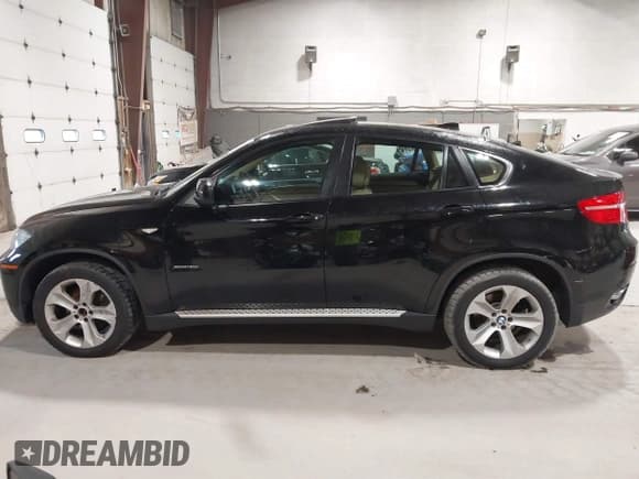 ✅ 2011 BMW X6 35i • VIN: 5UXFG2C56BLX09086 • Lot: 43459630. Listed on IAAI with 163,438 mi. Free auction sales archive from the USA and detailed vehicle history report at DreamBid. Image 14.