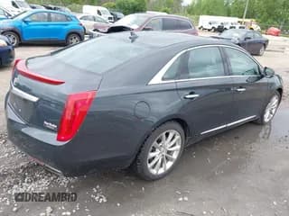 ✅ 2013 Cadillac XTS Premium • VIN: 2G61T5S32D9142784 • Лот: 42616365. Опубликован ранее на IAAI с пробегом 98 512 миль. Бесплатный доступ к архиву аукционных продаж из США и подробный отчёт об истории автомобиля на DreamBid. Изображение 4.
