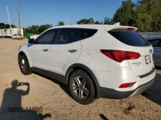2017 Hyundai Santa Fe 2.4L with VIN 5NMZT3LB6HH026899, listed as a Copart auction lot 87001105 with 135,479 mi miles and Clean title. Bid and sale history available at DreamBid. Image 2.