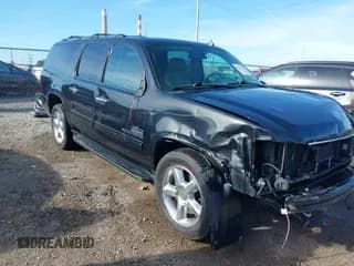 ✅ 2012 Chevrolet Suburban LT • VIN: 1GNSCJE05CR313048 • Lot: 42127574. Listed on IAAI with 173,229 mi. Free auction sales archive from the USA and detailed vehicle history report at DreamBid. Image 1.