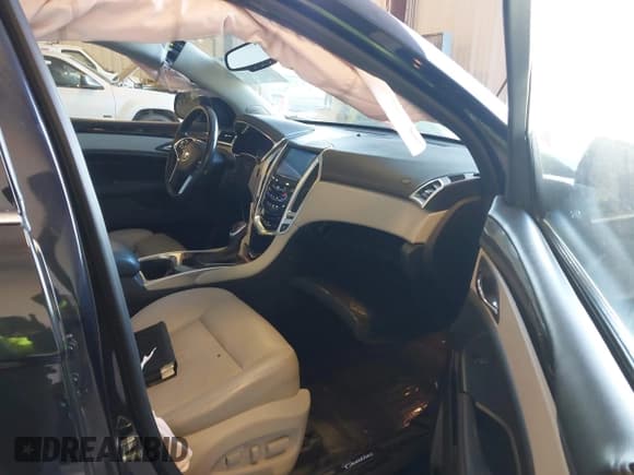 ✅ 2015 Cadillac SRX Luxury Collection • VIN: 3GYFNEE33FS569643 • Lot: 43407088. Listed on IAAI with 109,523 mi. Free auction sales archive from the USA and detailed vehicle history report at DreamBid. Image 5.