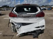 ✅ 2021 Chevrolet Bolt EV Premier • VIN: 1G1FZ6S03M4106496 • Lot: 90128125. Listed on Copart with 48,761 mi. Free auction sales archive from the USA and detailed vehicle history report at DreamBid. Image 6.