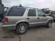 1999 Chevrolet Blazer LS with VIN 1GNDT13W9X2193172, listed as a Copart auction lot 85622594 with 160,054 mi miles and Salvage title. Bid and sale history available at DreamBid. Image 3.