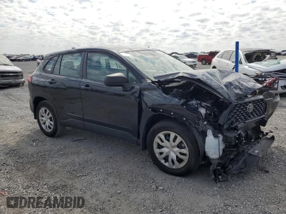 ✅ 2023 Toyota Corolla Cross L • VIN: 7MUAAAAG3PV050682 • Lot: 80054275. Listed on Copart with 51,704 mi. Free auction sales archive from the USA and detailed vehicle history report at DreamBid. Image 4.
