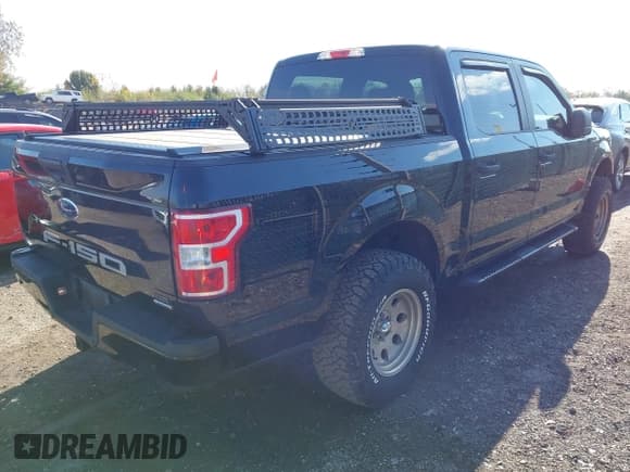 ✅ 2018 Ford F-150 XL • VIN: 1FTEW1EP9JFD26412 • Lot: 43583715. Listed on IAAI with 98,074 mi. Free auction sales archive from the USA and detailed vehicle history report at DreamBid. Image 4.
