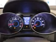 ✅ 2015 Hyundai Veloster • VIN: KMHTC6AD6FU240840 • Lot: 78868714. Wystawiony na Copart z przebiegiem 94 345 mil. Bezpłatny archiwum sprzedaży aukcyjnych z USA i szczegółowy raport historii pojazdu na DreamBid. Zdjęcie 9.