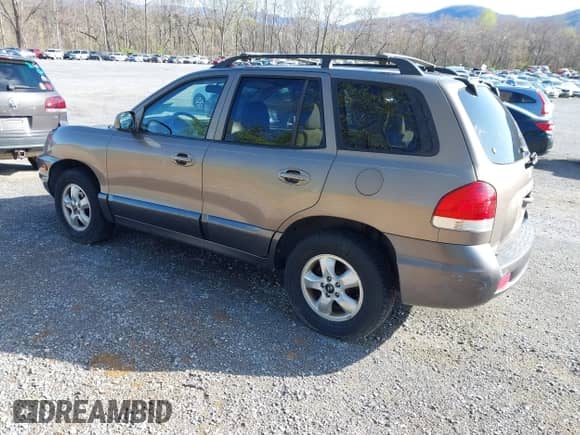 ✅ 2005 Hyundai Santa Fe GLS • VIN: KM8SC13D15U013890 • Лот: 41917783. Размещён на IAAI с пробегом 227 891 миль миль. Получите бесплатный доступ к архиву аукционных продаж из США и посмотрите подробный отчёт об истории автомобиля на DreamBid. Изображение 3.