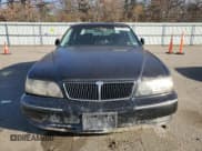 ✅ 1999 Infiniti Q45 • VIN: JNKBY31A6XM602090 • Lot: 82469314. Listed on Copart with 133,983 mi. Free auction sales archive from the USA and detailed vehicle history report at DreamBid. Image 5.