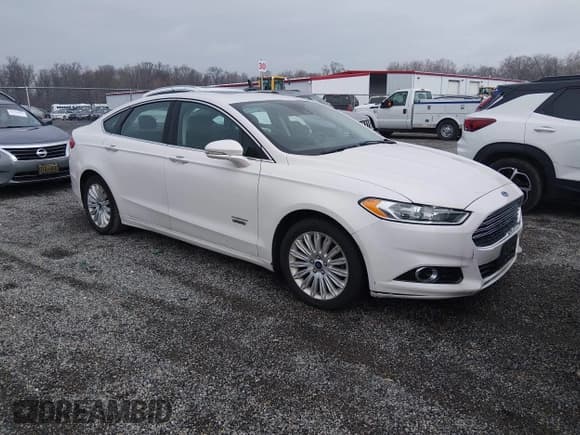 ✅ 2014 Ford Fusion Titanium • VIN: 3FA6P0SU6ER397622 • Lot: 43816342. Listed on IAAI with 121,145 mi. Free auction sales archive from the USA and detailed vehicle history report at DreamBid. Image 1.