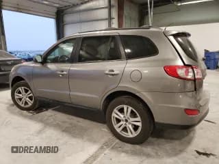 ✅ 2011 Hyundai Santa Fe SE • VIN: 5XYZHDAG4BG005119 • Lot: 85141464. Listed on Copart with 186,384 mi. Free auction sales archive from the USA and detailed vehicle history report at DreamBid. Image 2.