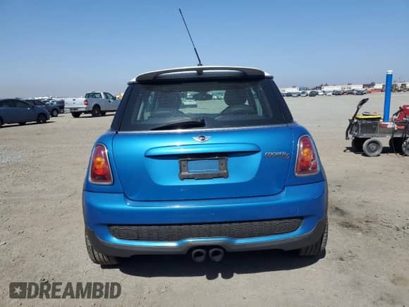 2010 MINI Hardtop S with VIN WMWMF7C58ATX42725, listed as a Copart auction lot 59818915 with 86,452 mi miles and Salvage title. Bid and sale history available at DreamBid. Image 6.
