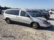 ✅ 1998 Ford Windstar LX • VIN: 2FMZA5145WBC60920 • Lot: 71553874. Wystawiony na Copart z przebiegiem 232 744 mil. Bezpłatny archiwum sprzedaży aukcyjnych z USA i szczegółowy raport historii pojazdu na DreamBid. Zdjęcie 4.