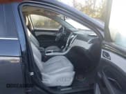 ✅ 2015 Cadillac SRX Premium Collection • VIN: 3GYFNGE35FS616599 • Lot: 43431289. Wystawiony na IAAI z przebiegiem 159 326 mil. Bezpłatny archiwum sprzedaży aukcyjnych z USA i szczegółowy raport historii pojazdu na DreamBid. Zdjęcie 5.