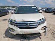 ✅ 2018 Honda Pilot EX-L • VIN: 5FNYF6H51JB059212 • Lot: 81571465. Listed on Copart with 120,870 mi. Free auction sales archive from the USA and detailed vehicle history report at DreamBid. Image 5.