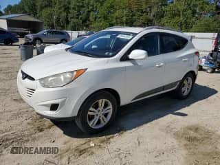 2010 Hyundai Tucson GLS с VIN KM8JUCAC9AU021356, выставлен на аукционе Copart как лот 80484105 с пробегом 189 108 миль миль и Чистый • Clean title. История ставок и продаж доступна на DreamBid. Изображение 1.