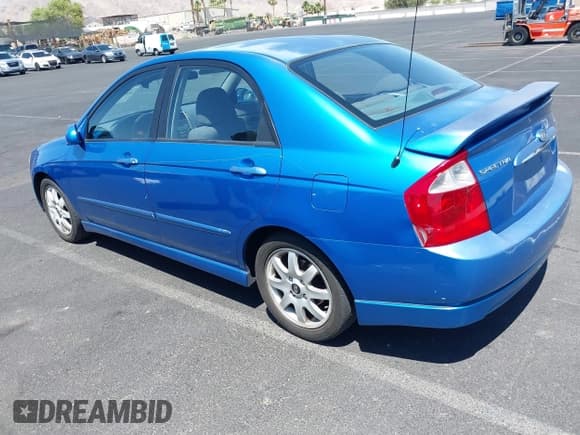 ✅ 2005 Kia Spectra LX • VIN: KNAFE121855155765 • Lot: 42509011. Listed on IAAI with 99,818 mi. Free auction sales archive from the USA and detailed vehicle history report at DreamBid. Image 3.