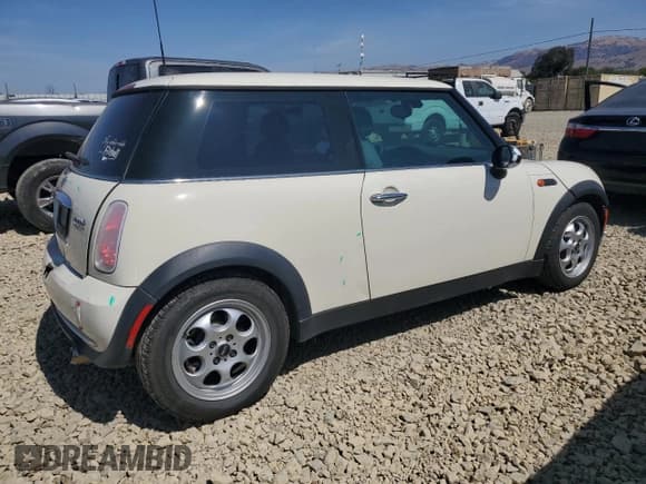 ✅ 2005 MINI Hardtop • VIN: WMWRC33505TJ69512 • Lot: 69698855. Listed on Copart with 90,660 mi. Free auction sales archive from the USA and detailed vehicle history report at DreamBid. Image 3.